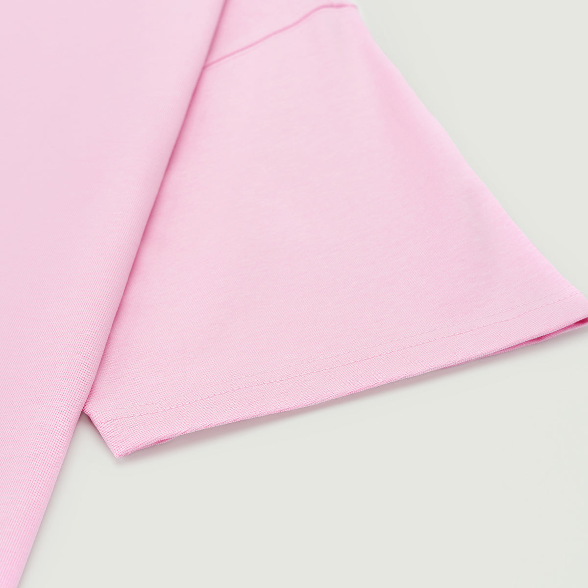 Premium cotton boxy tee by UNBOUGHT close up