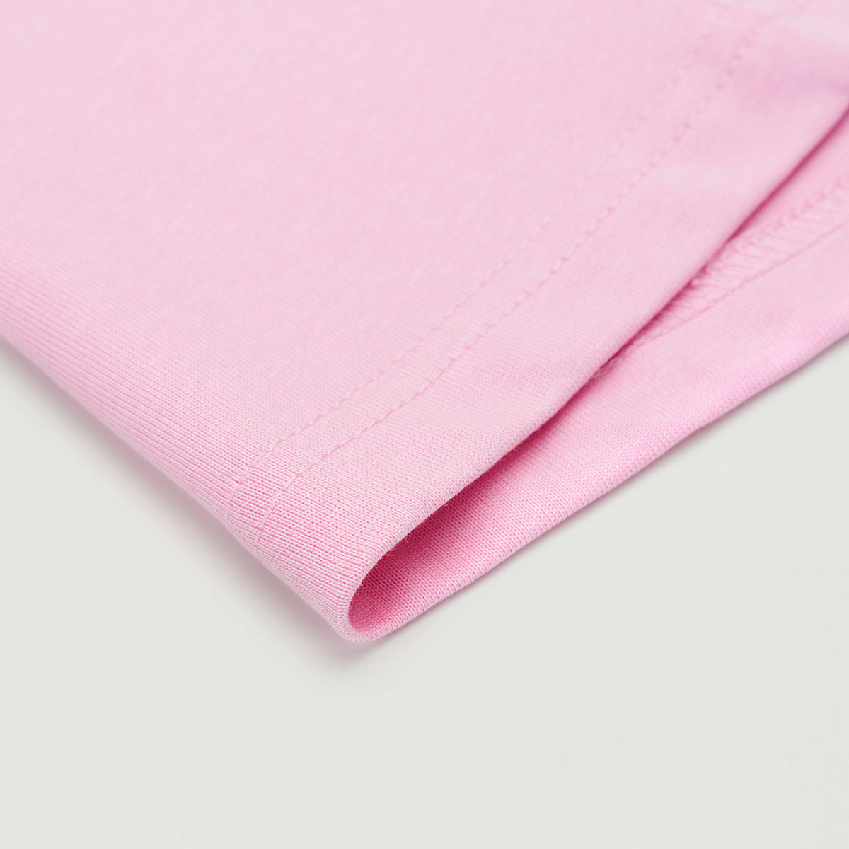 Premium cotton boxy tee by UNBOUGHT close up